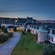The Hotel le Manoir exterior in Baie Comeau, Quebec, is illuminated against the night sky